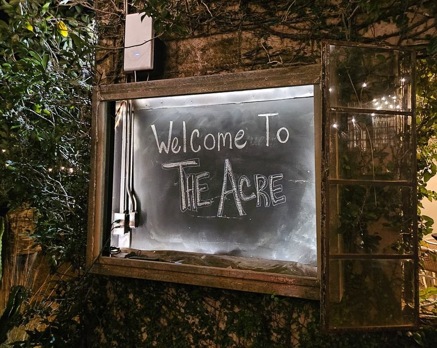 the acre chalkboard sign